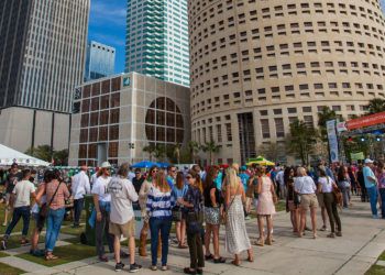 People enjoy live music events on the lawn of Curtis Hixon Waterfront Park in downtown Tampa.
