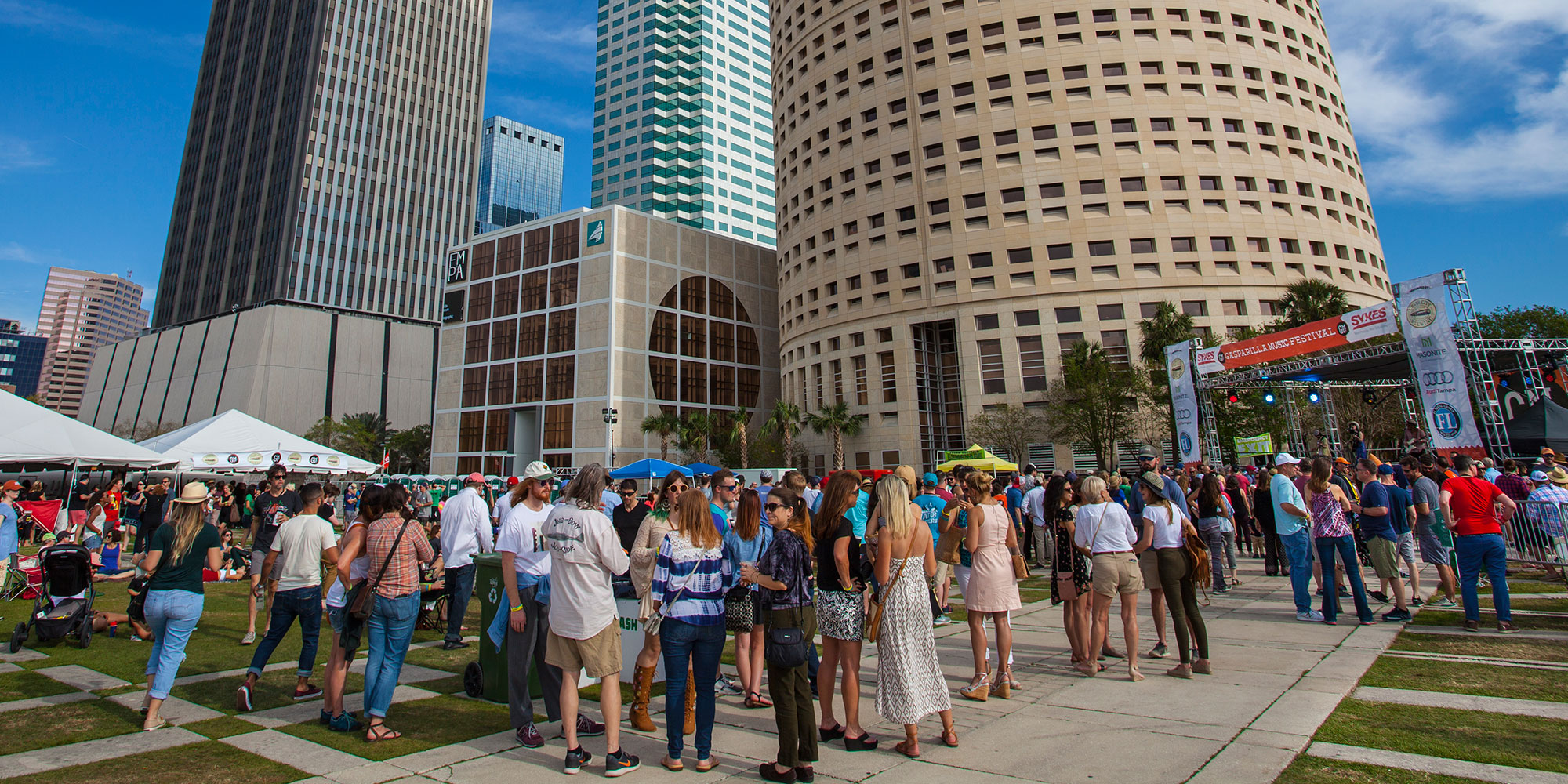People enjoy live music events on the lawn of Curtis Hixon Waterfront Park in downtown Tampa.