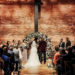 A wedding ceremony at Armature Works is staged in front of the building’s photogenic brick wall. Photo courtesy of Armature Works
