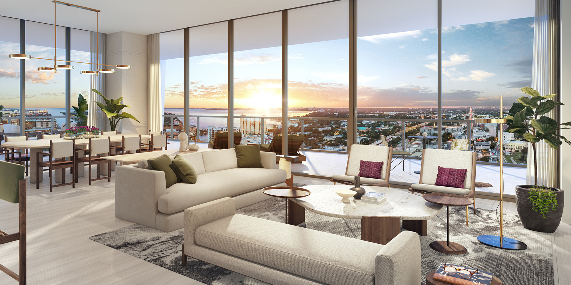 This rendering gives a look inside a Pendry Tampa condo, including an open concept living and dining area and floor-to-ceiling glass walls to maximize the view along the Tampa Riverwalk.